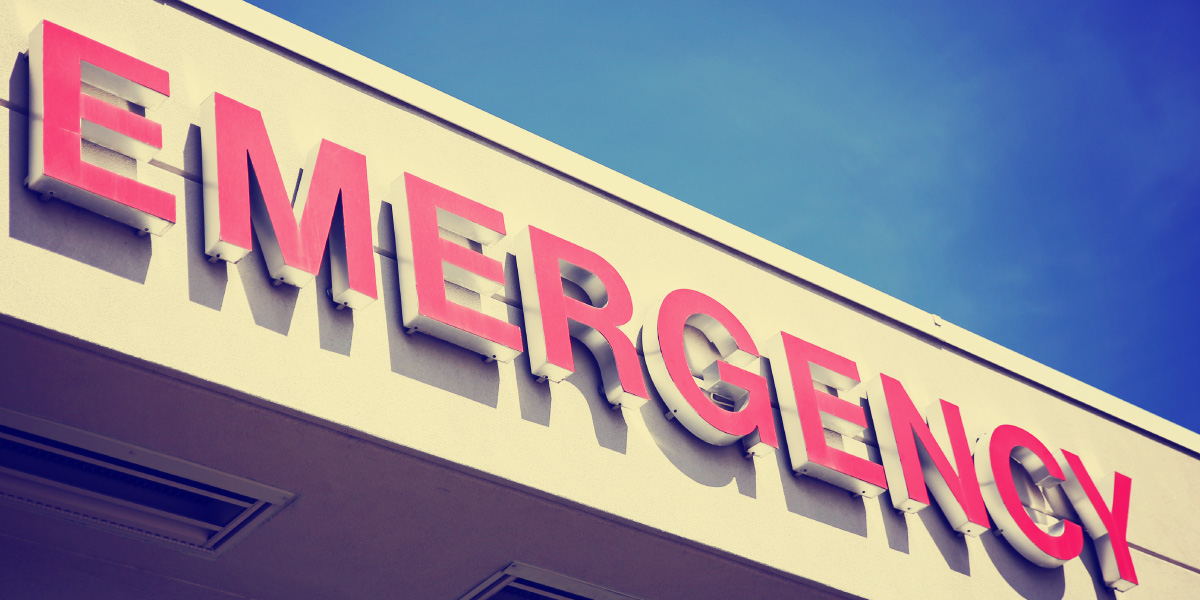 Close up of a hospital emergency department sign in red.